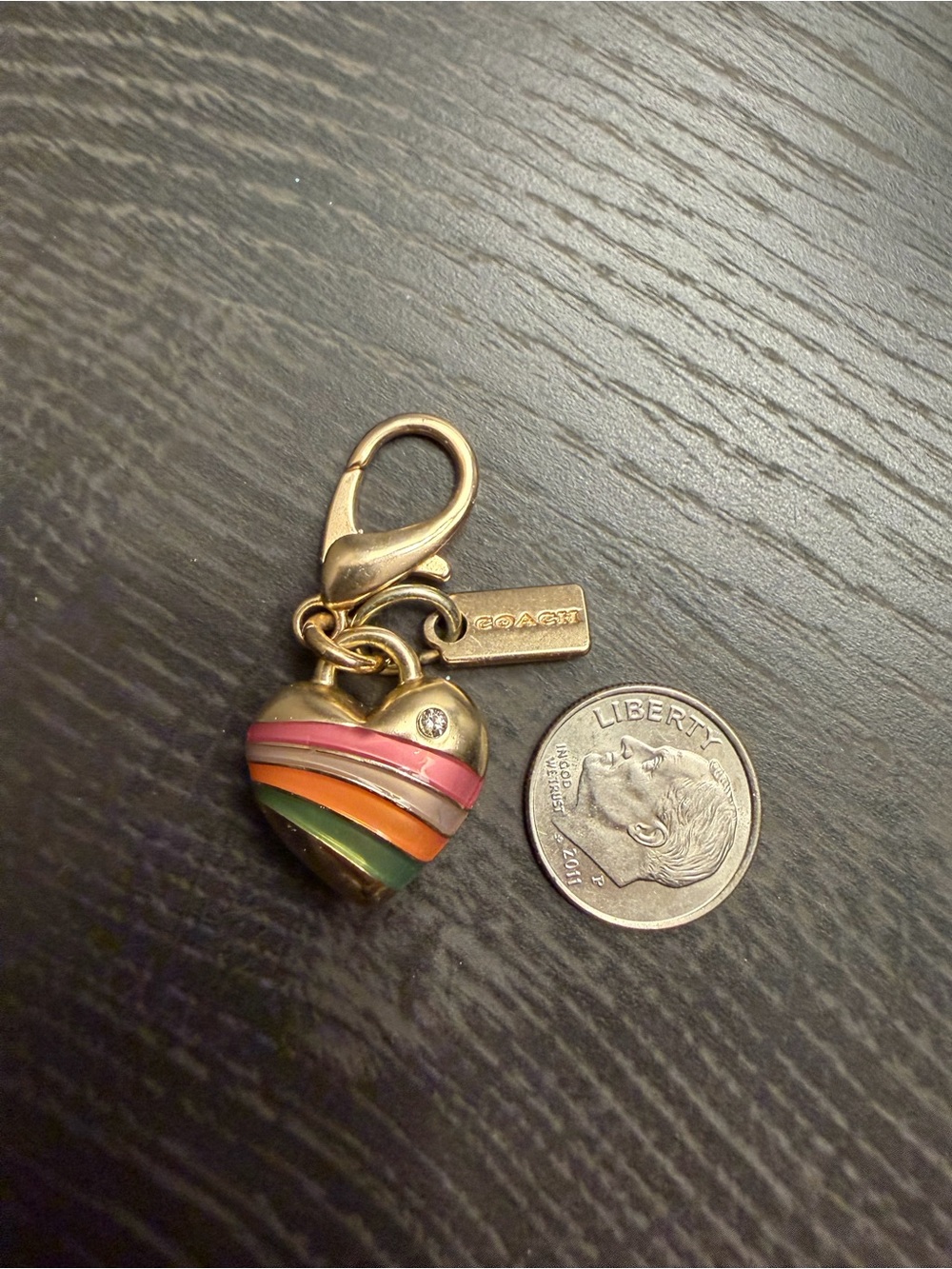 Coach gold and rainbow heart charm